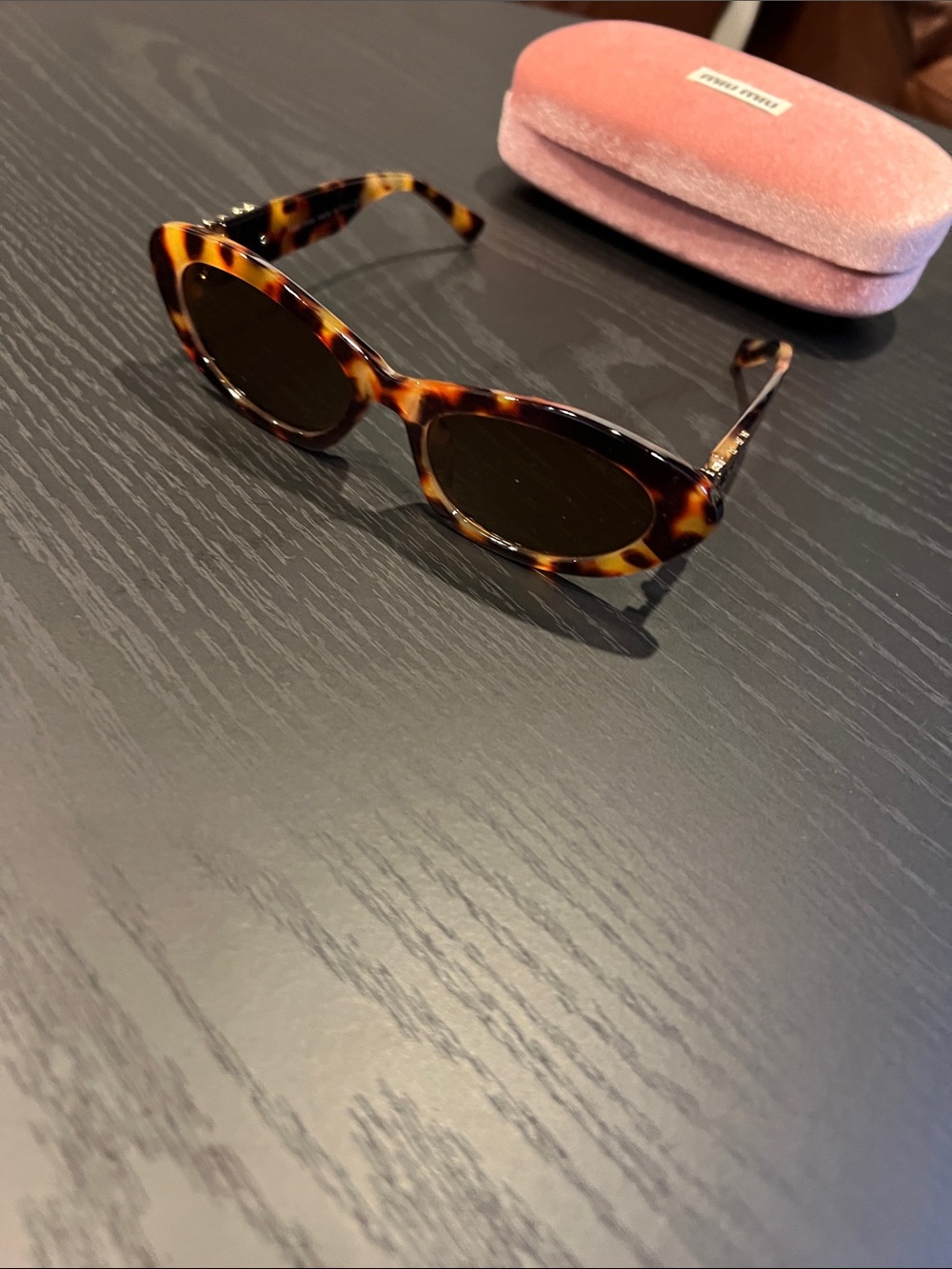 Miu Miu Tortoiseshell Oval Sunglasses with Brown Lenses